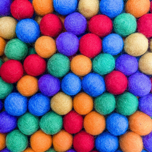 Epic kits explore play imagine create. Rainbow felt balls. Pure wool made in Nepal Fair Trade. Small world play, sensory play. Toddler play ideas. Natural eco-friendly play ideas. Sensory play kits. Sensory play ideas.